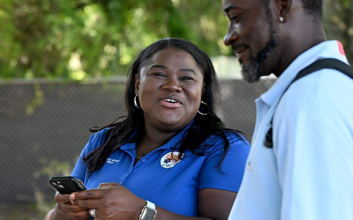 Bradenton Police officer Jordan Poulos works with Manatee County EMS case worker Tameka Foster Wilson as part of a homeless outreach team to build relationships with locally unhoused people and connect them with services and resources.