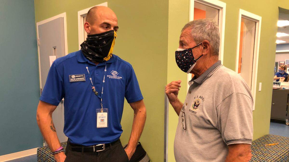 3/29/2021--The Travis Manion Foundation and the Boys & Girls Clubs of Manatee County have announced a partnership benefiting children and veterans. Shown above are David T. Anderson, graduation and career specialist, left, and retired Army Lt. Col. Tom Piazze.