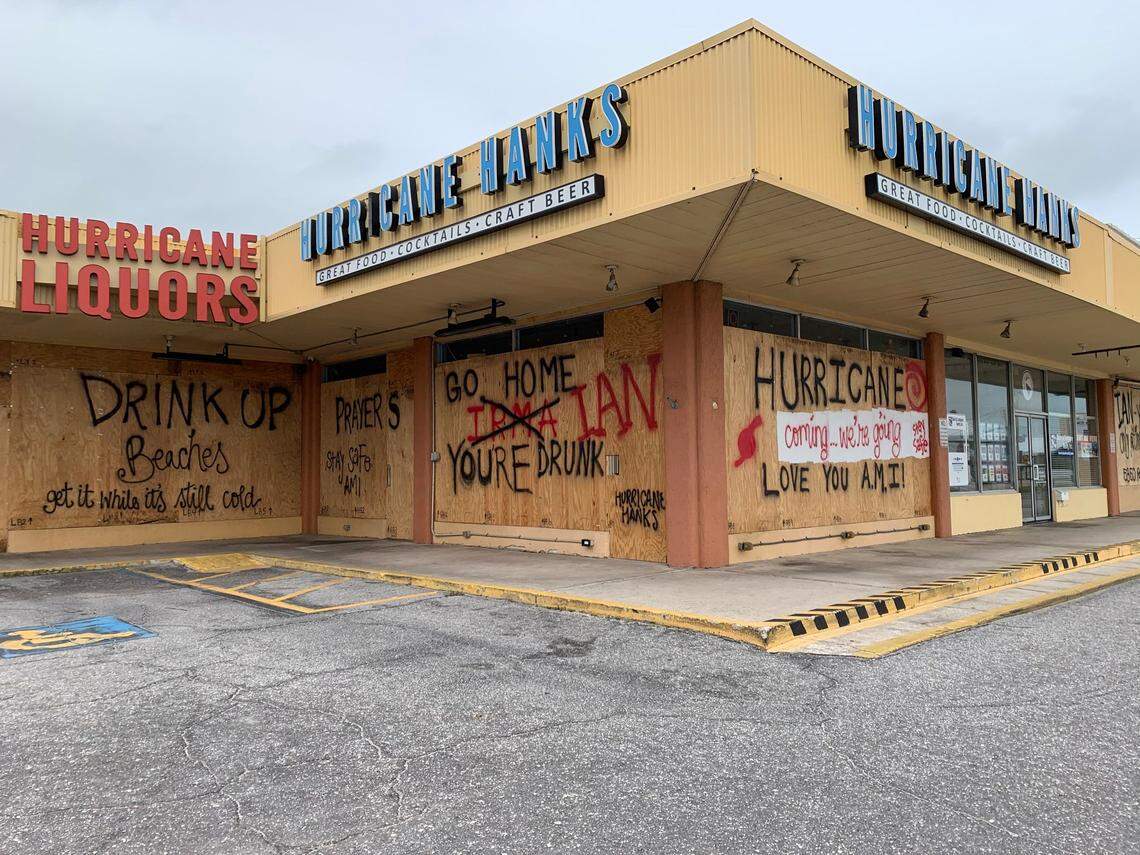 A store boarded up on Holmes Beach after Hurricane Ian on Thursday, Sept. 29, 2022.
