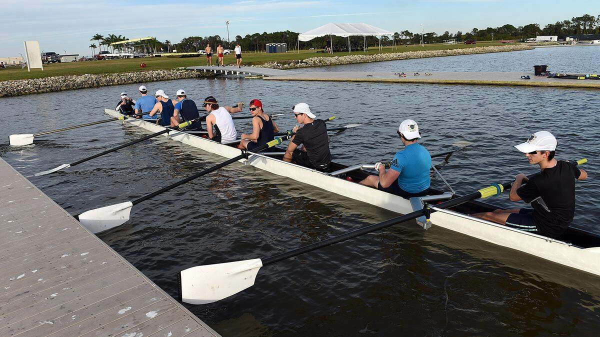 The Eton College rowing team, actually high school students, push away from the dock at Nathan Benderson Park Thursday afternoon for training. 
 TIFFANY TOMPKINS-CONDIE/Bradenton Herald