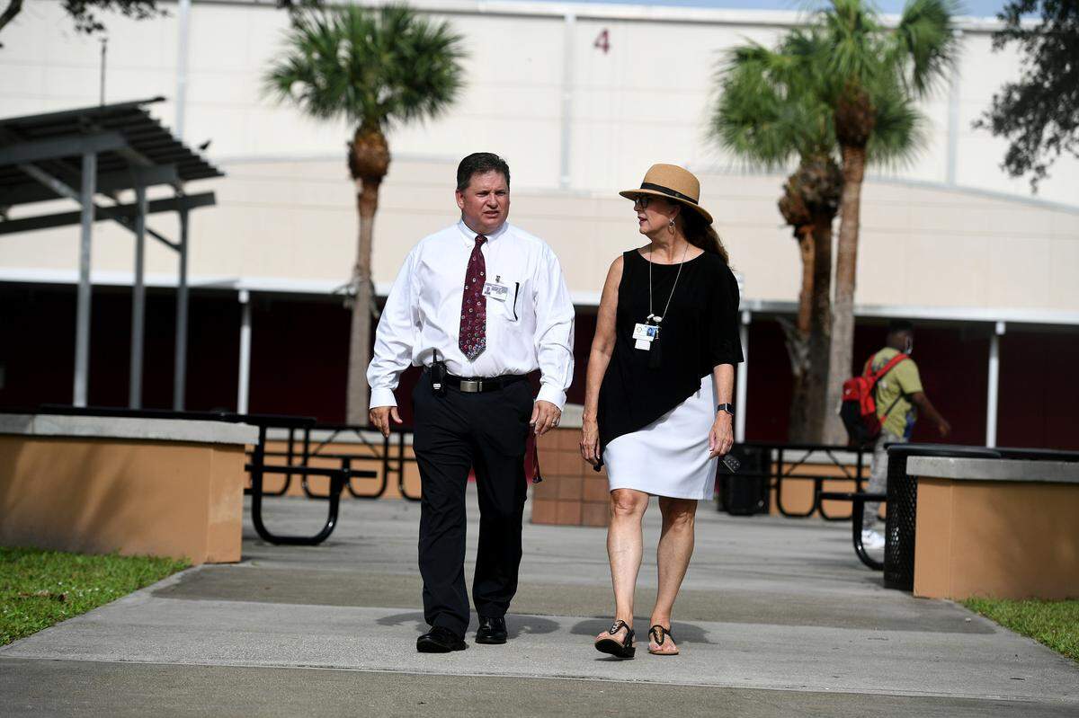 New King Middle School Principal Michael Mullen stands for photos with Superintendent Cynthia Saunders on the first day of school.