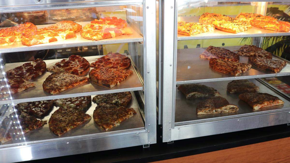 Pizzano’s Pizza & Grinderz, 5318 Marina Drive, Holmes, Beach, sells whole pizzas and pizzas by the slice seven days a week.