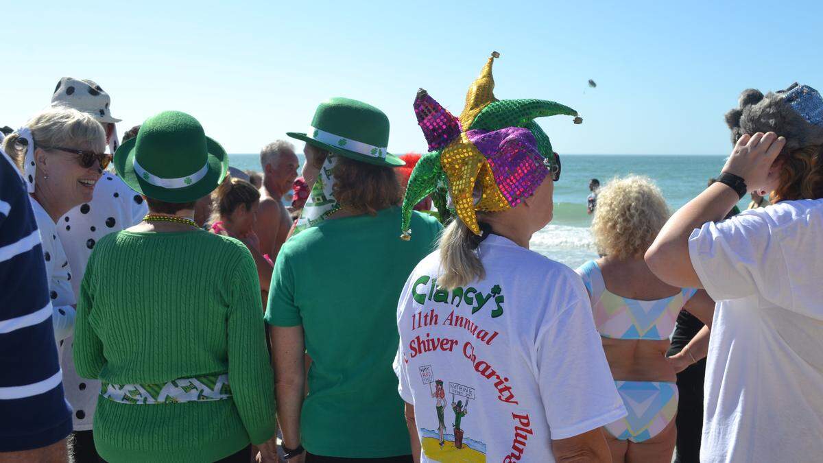 Spectators and participants line Bradenton Beach for a past Shamrock Shiver charity plunge.