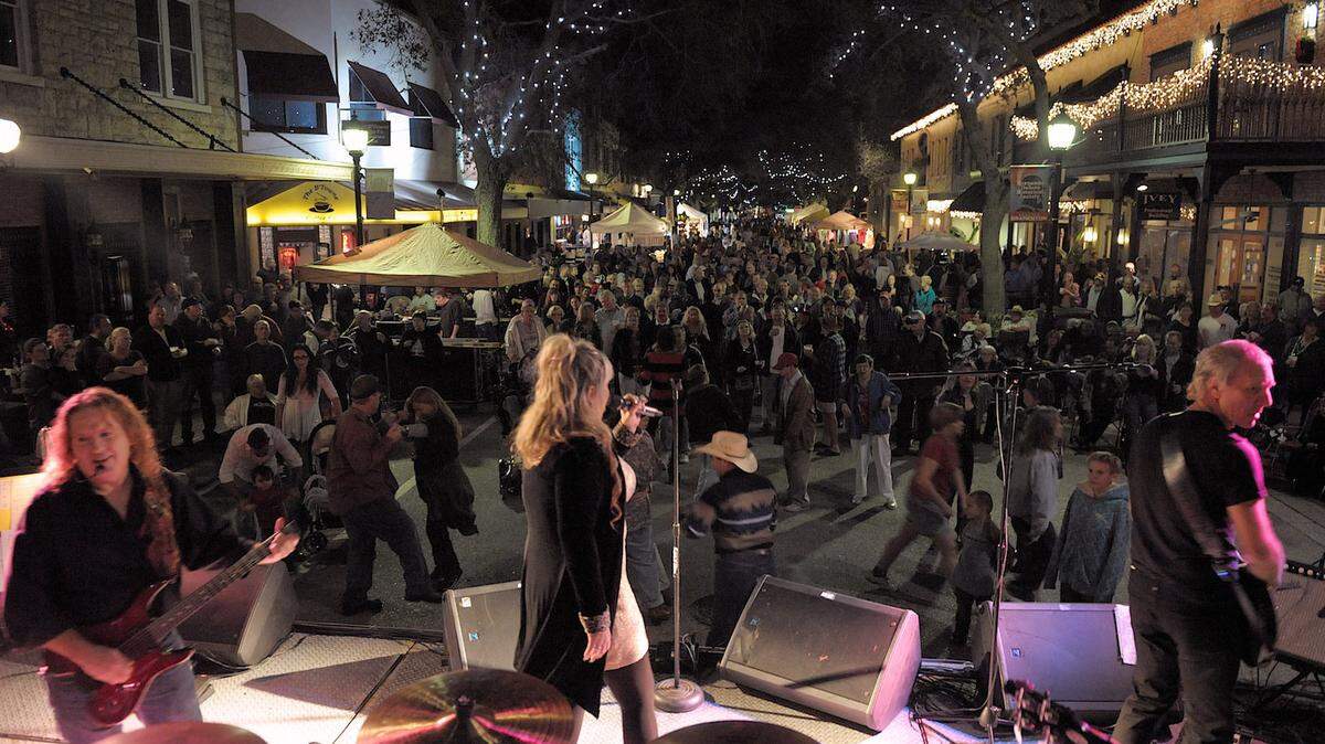 Revelers pack downtown Bradenton as the band performs during a past Main Street Live New Year’s Eve celebration.
