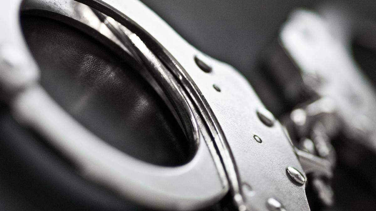 closeup on handcuffs. selective focus.