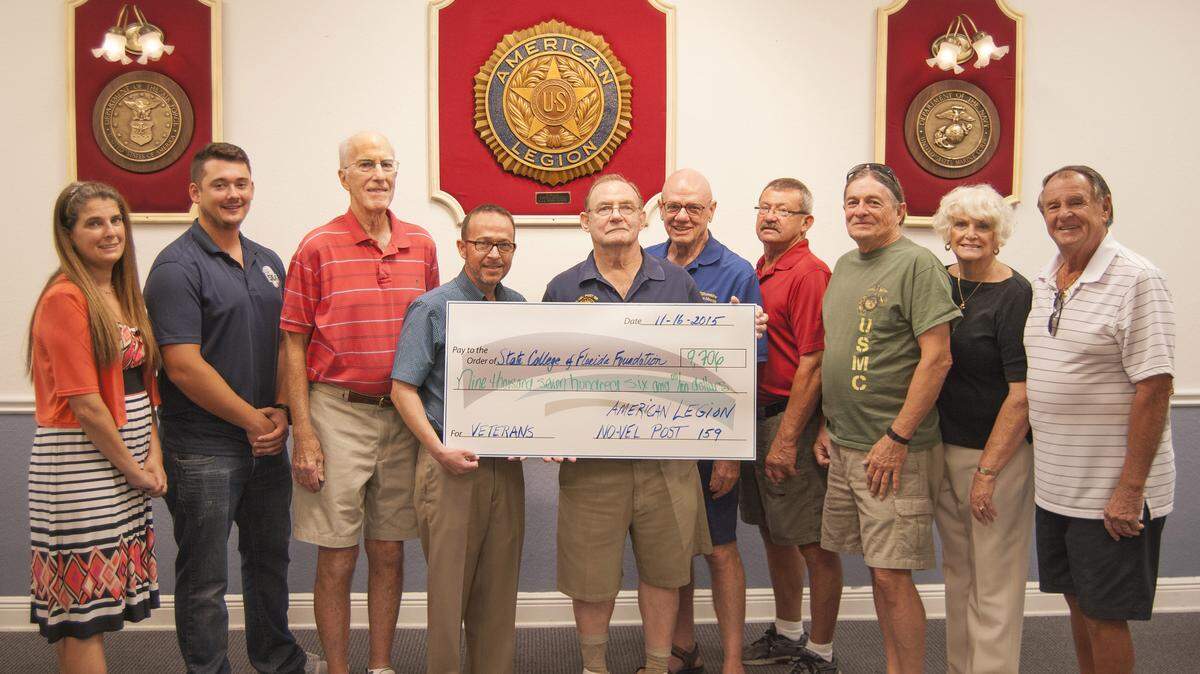 From left: SCF Student Veterans Association (SVA) Advisor Jennifer Meier, SCF Venice SVA President Donald Humphrey, VGO Committee Chair Mike Vanech, SCF Venice Advisor of Veterans Services William Graydon, Post Commander Richard Lemm, Post Adjunct Wil Brickner, VGO Committee Members Steve Doughty and Cliff White, Women's Auxiliary Board Member Julia Griffith, and VGO Committee Member Joe Jablowski. PHOTO PROVIDED