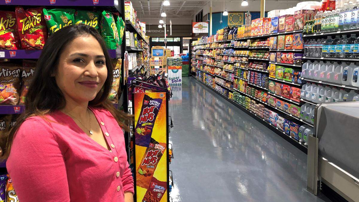 Karina Cervantes stands in one of the wide aisles at Acapulco Tropical Y Mas, which opens Saturday at 3410 US 301 in Ellenton.