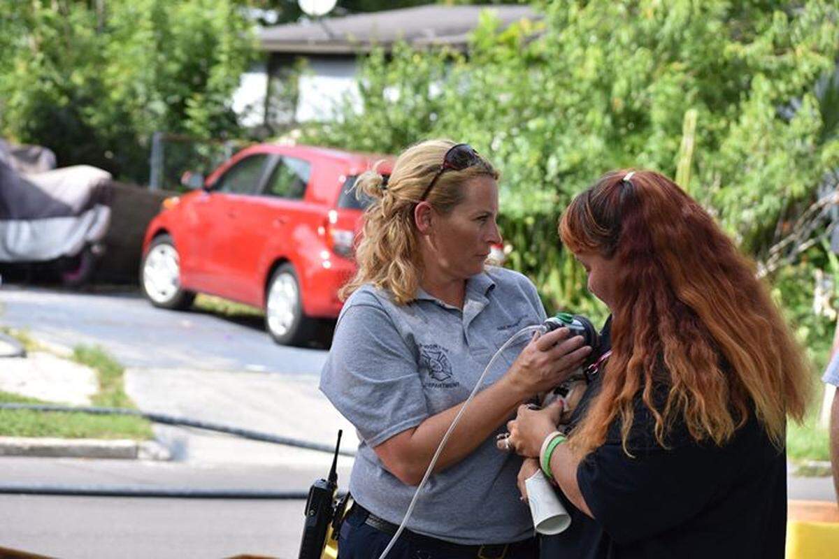 Firefighters battled a house fire Monday afternoon in the 600 block of 26th Avenue West in Bradenton. Several animals were rescued from the house, first responders said.