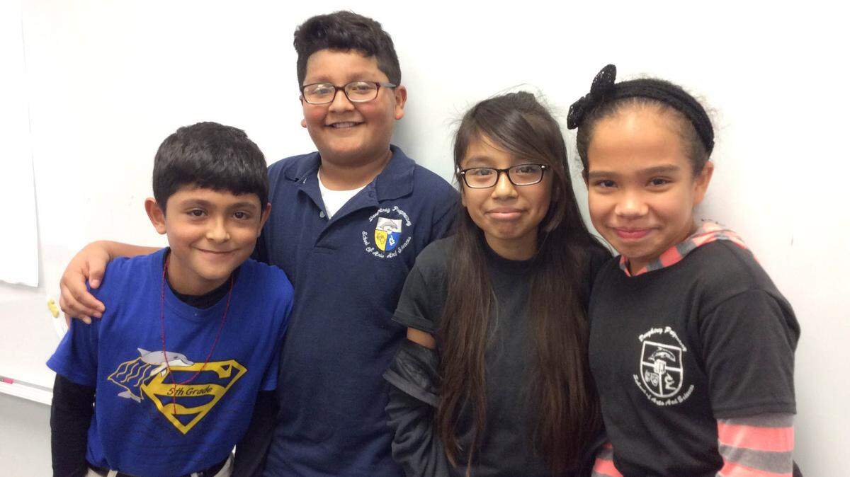 Luis Flores, Juan Vazquez, Yamile Quezada and Nevaeh Ortiz were four of the 14 fifth-grade students at Daughtrey Elementary School who headed to Birmingham, Alabama, over the holiday weekend. MEGHIN DELANEY / Bradenton Herald