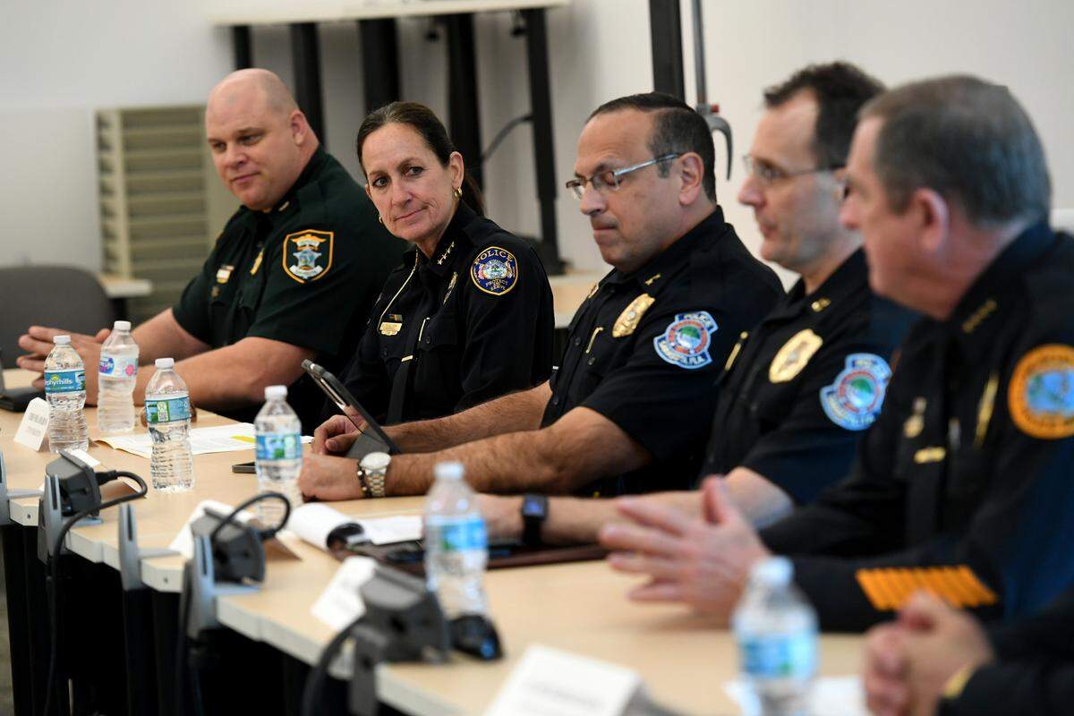 Second from left, Bradenton Police Chief Melanie Bevan participates in a roundtable to discuss crime and attacks on law enforcement hosted by Congressman Vern Buchanan.