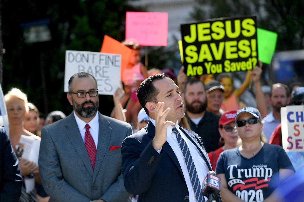 State Rep. Anthony Sabatini leads an anti-mask rally with Rev. Joel Tillis at the Manatee County Courthouse along with about 100 people on Monday, Aug. 3, 2020.