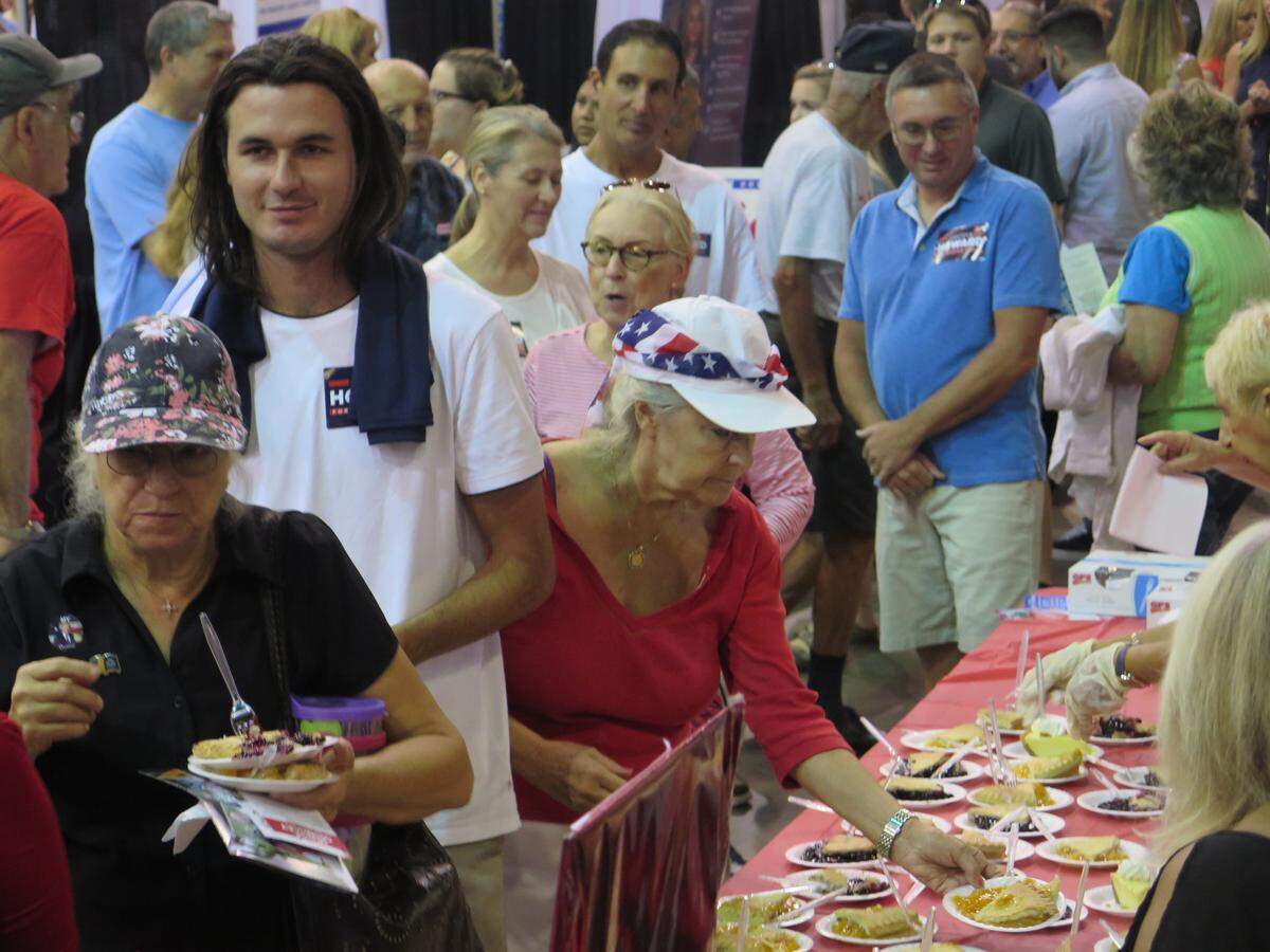 During the event, guests were served slices of pie while they filled out straw poll ballots to gauge the results Sarasota might see during the primary election.