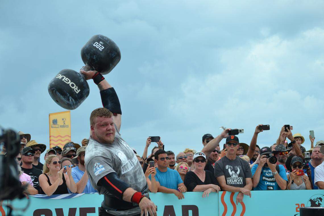 Tom Stoltman competes in the overhead medley challenge at the World’s Strongest Man competition on Anna Maria Island.
