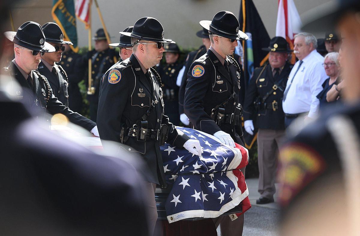 The community and law enforcement gather at Bayside Community Church to pay respects to Florida Highway Patrol Master Trooper Joseph Bullock who was killed in the line of duty last week.