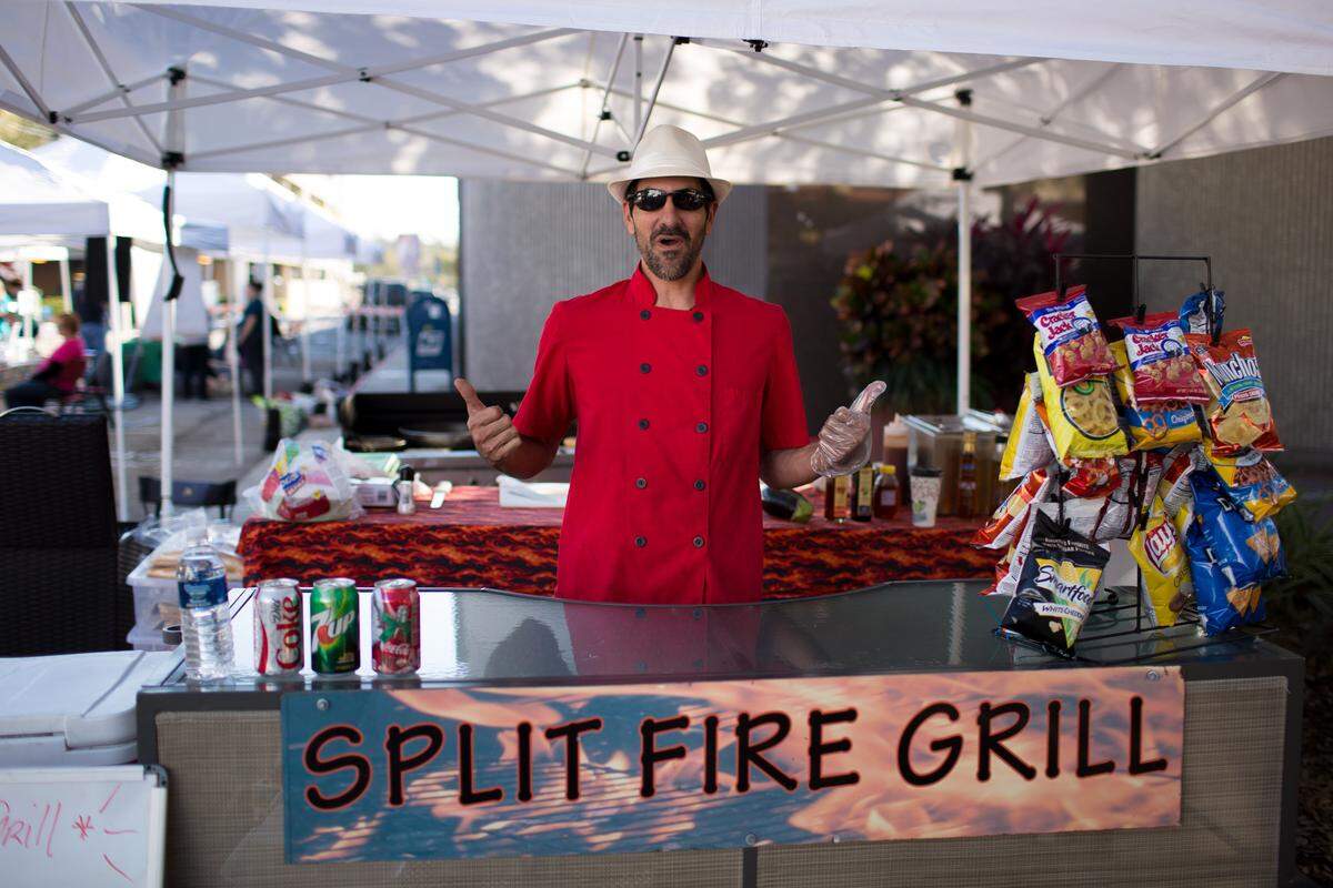 Marcus Anderson serves up sandwiches at the Bradenton Farmers' Market, Main Street Live other local events.