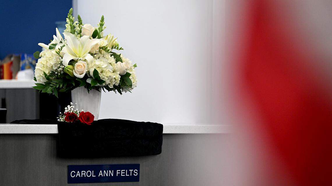 Flowers sit at Carol Felts’ seat at the dais at a meeting of the Manatee County Commission during a tribute to Felts on March 3, 2026.