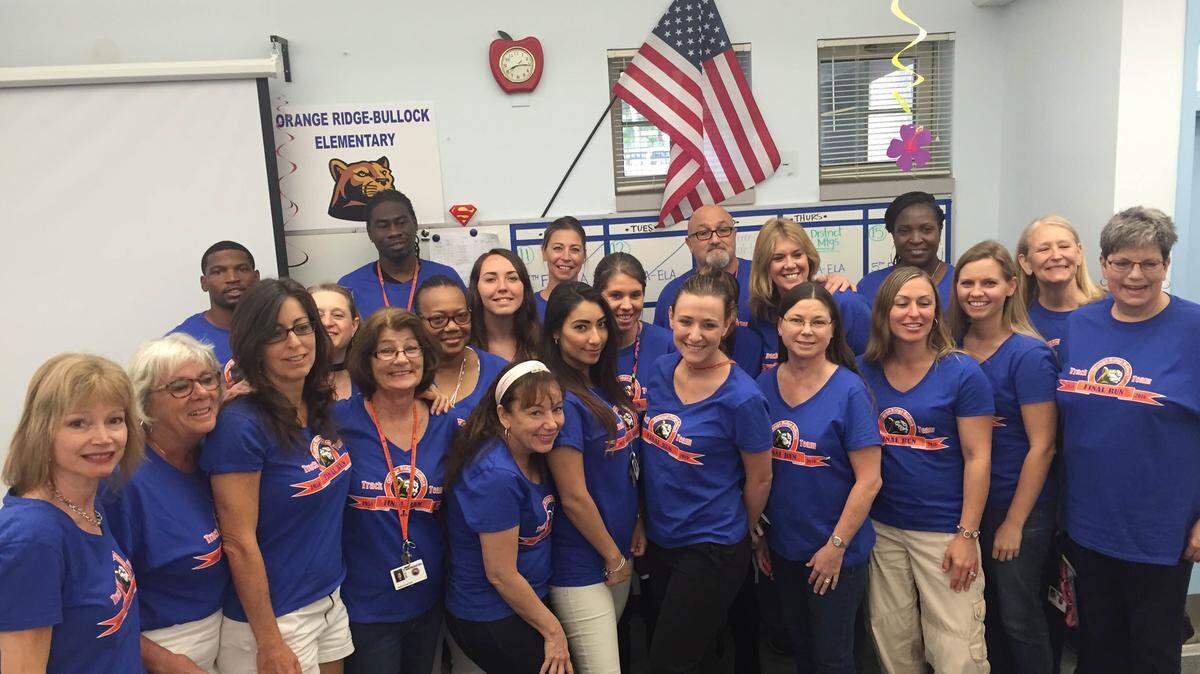 Orange Ridge-Bullock Elementary School teachers pose in their "final run" shirts on Thursday. The school will close for the 2016-17 year. MEGHIN DELANEY / Bradenton Herald