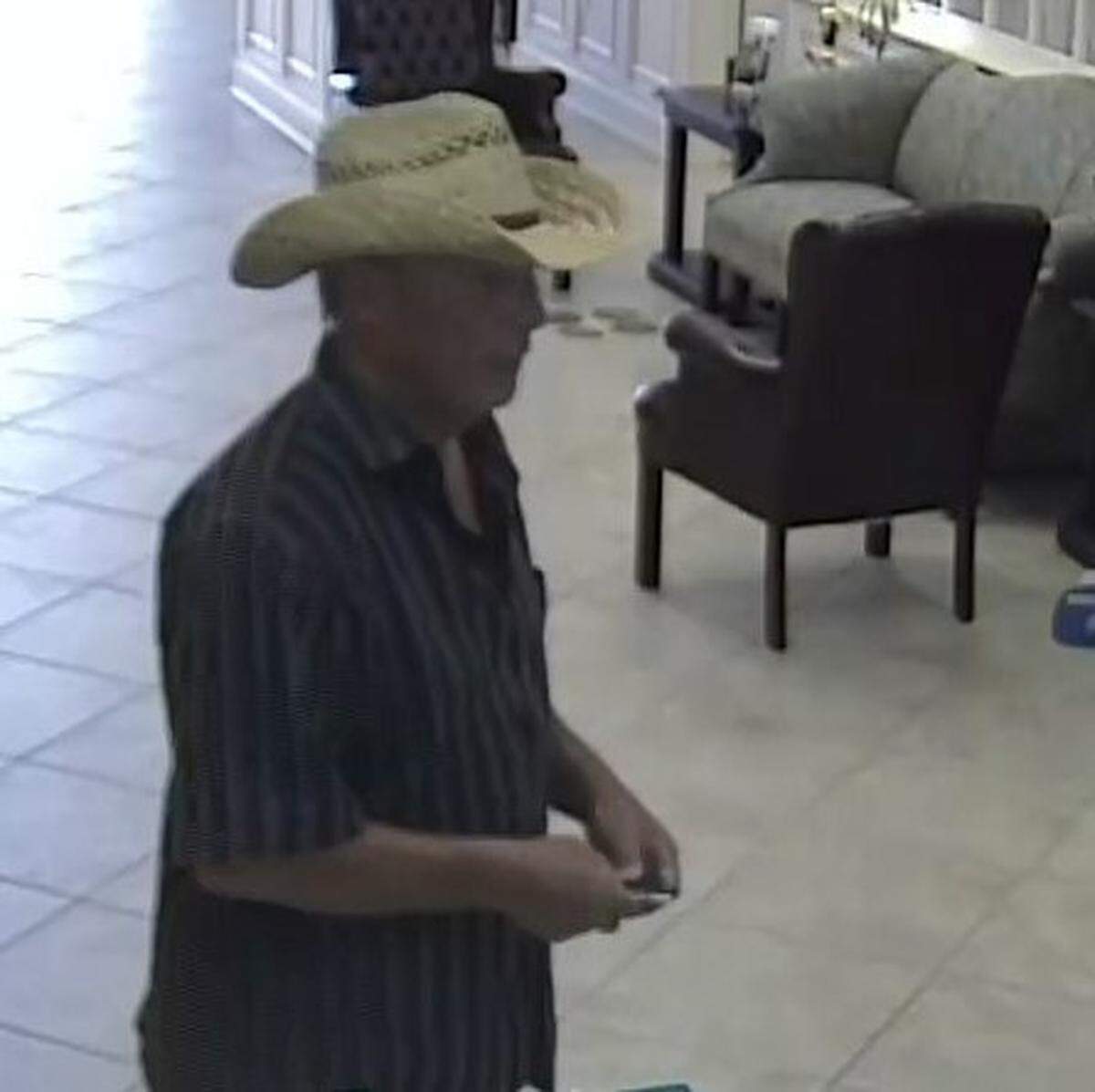 Surveillance footage of a man, who investigators believe was Edward J. Reynolds, wanted in connection with a July 25 armed robbery of a Venice, Florida, bank.