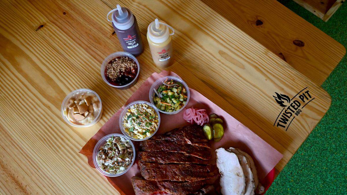 Brisket, ribs, turkey and sides served on a tray at the Twisted Pit BBQ on Main Street in Lakewood Ranch.