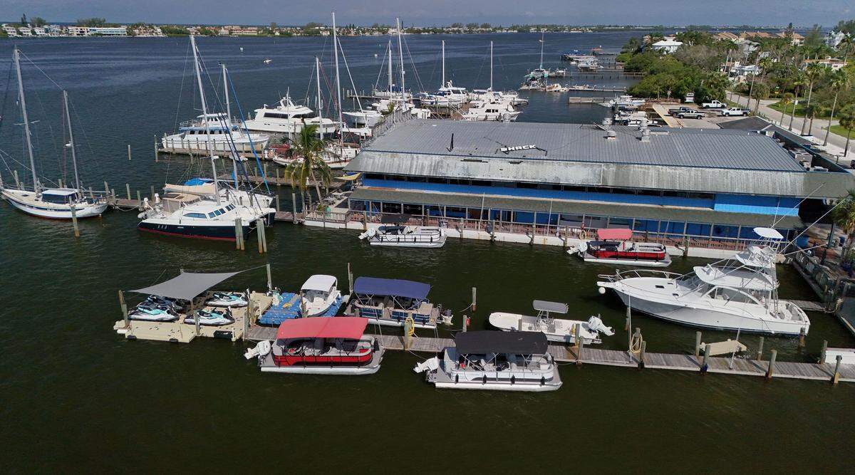 Seafood Shack owners have sent eviction notices to local business owners before Manatee County can close the purchase of the iconic Cortez restaurant and marina.