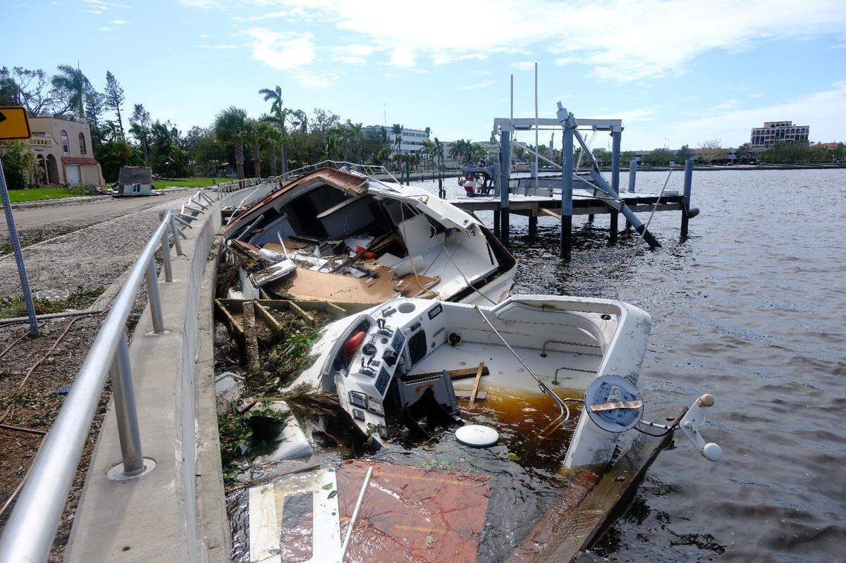A large boat slammed into Brian Zoller’s private dock and the Bradenton Riverwalk’s seawall in front of his home on Riverside Drive East during Hurricane Milton.
