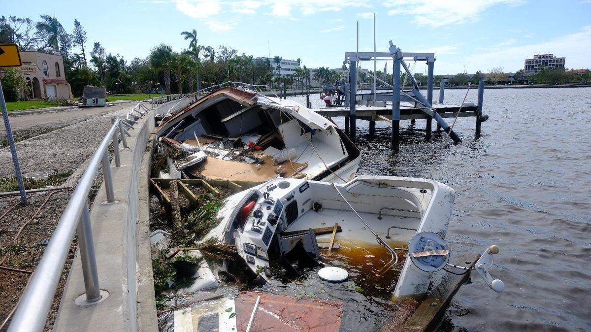 A large boat slammed into Brian Zoller’s private dock and the Bradenton Riverwalk’s seawall in front of his home on Riverside Drive East during Hurricane Milton.