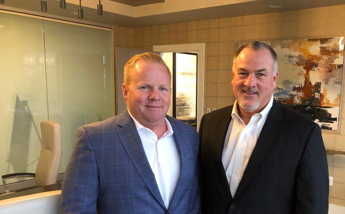 Newly promoted SUNZ Insurance president Rick Leonard, left, is shown with CEO Steven Herrig. The fast-growing company, based in Bradenton, provides workers compensation insurance.