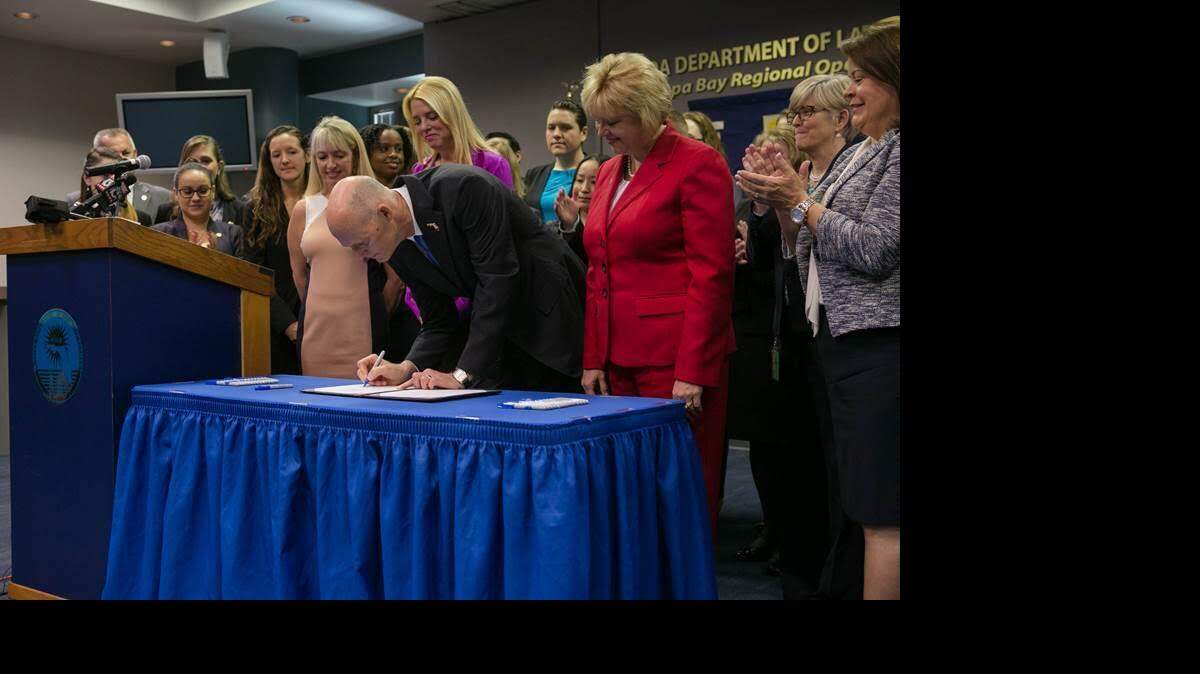 Florida Gov. Rick Scott ceremonially signs legislation to eliminate rape kit testing backlog. Provided photo.
 