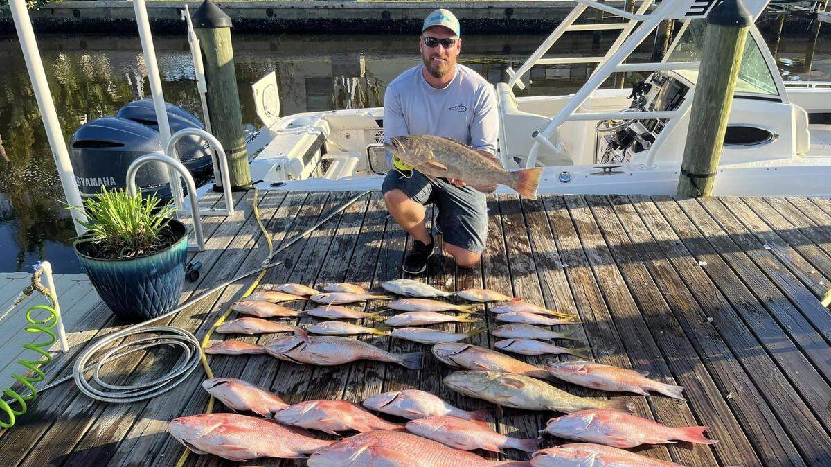 Travis Redder with his haul caught on Oct. 8, 2022, offshore of Anna Maria Island.