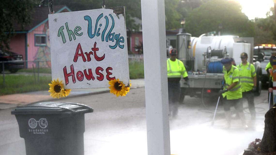 City of Bradenton employees were busy pressure washing the art from the sidewalks on 12th Avenue West in the Village of the Arts on Wednesday, Aug. 27, 2025. The city said in a release that it is “fully complying with FDOT’s order and is working to complete the required removals by the September 4 deadline.”