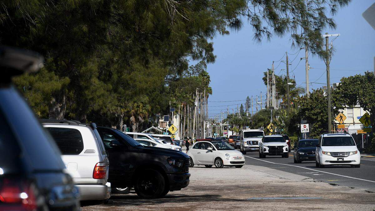 The parking spaces at Cortez Beach on Anna Maria Island are some with the easiest and closest access to the beach, as visitors park right along Gulf Drive.