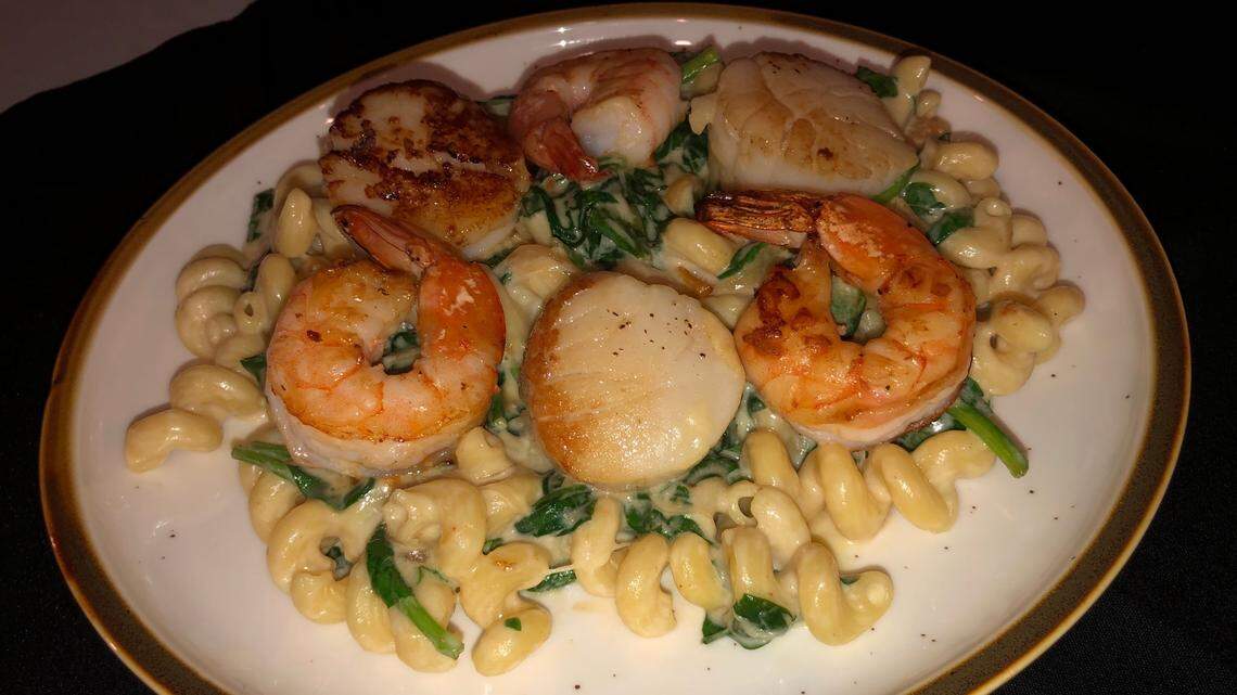 Bourbon & Bones may be a steakhouse, but not everything on the menu is steak. For instance, Rockefeller pasta (large shrimp, sea scallops, spinach, caramelized onions, bacon, Parmesan cheese and Cavatappi), shown above.