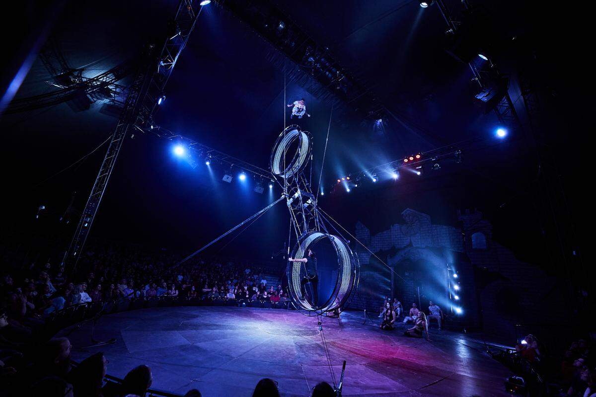 Luis Fernandez and Jorge Vargas perform in the “Double Wheel of Death” act in Cirque Paranormal, a sinister circus that will stop in Palmetto from Jan. 6-17.