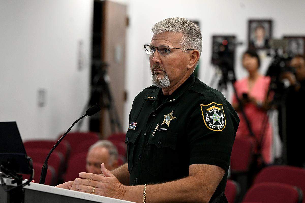 Sheriff Rick Wells presents during a special Manatee County Commission meeting Tuesday, April 16, 2024, on the impacts of illegal immigration in the county.