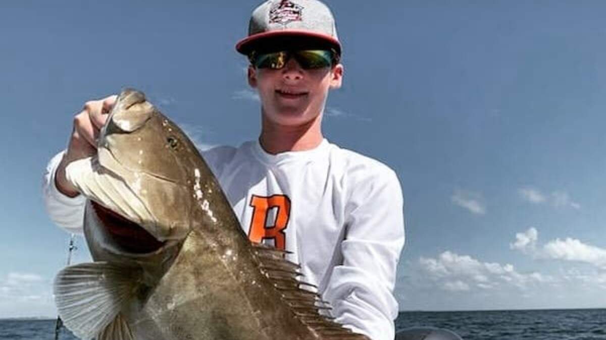 A member of one of Captain Wes Wildman’s charter fishing excursions shows of a gag grouper caught in November 2022.