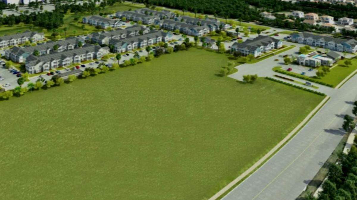 An aerial rendering depicts what the Springs at Ellenton apartments will look like from 60th Avenue East. The empty green space is reserved for 125,000 square feet of commercial development.
