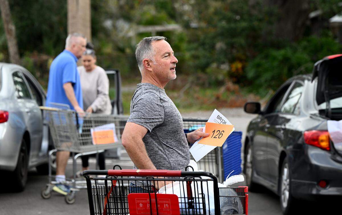 Over 30 volunteers gathered at the Salvation Army at 5328 24th St. E. in Bradenton to distribute Christmas gifts and turkeys to the families of 1,100 children through the Angel Tree program.