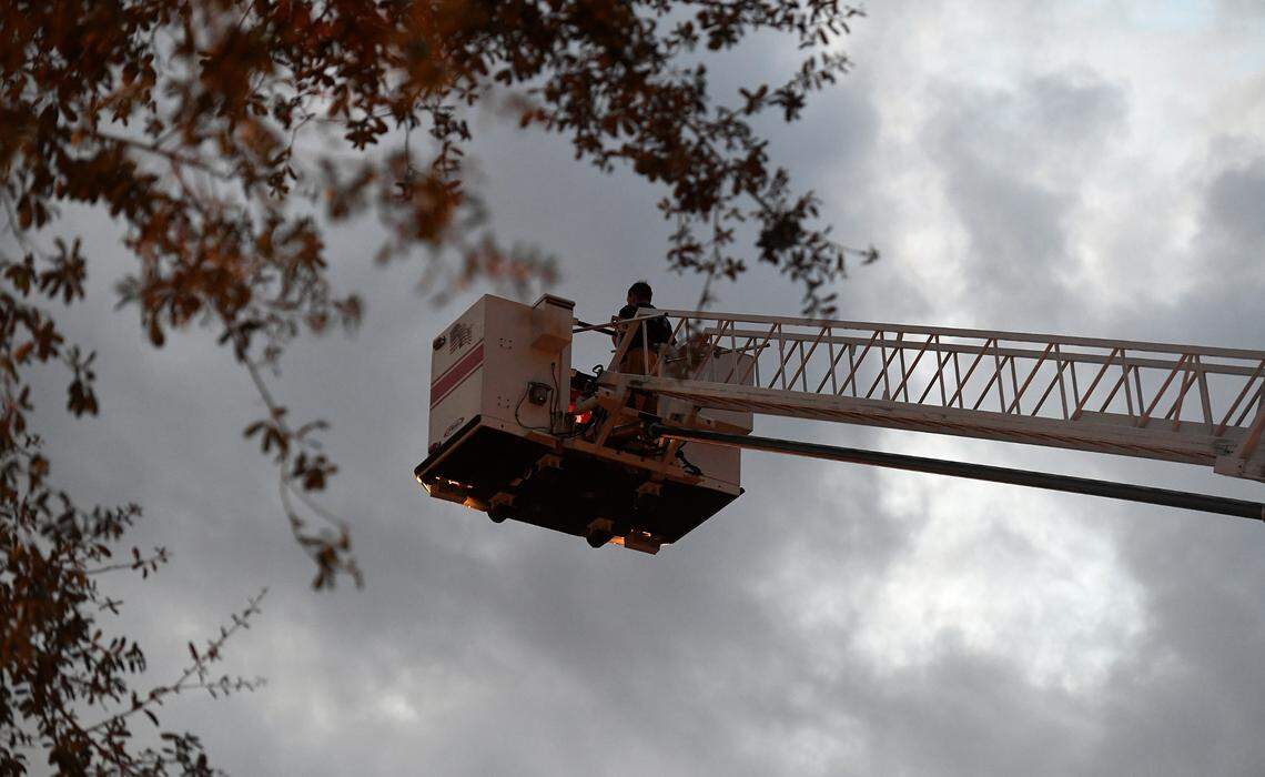 Firefighters work at the scene of a fire that caused about $2 million in damages and claimed the lives of three pets on Wednesday, Jan. 4, 2023.