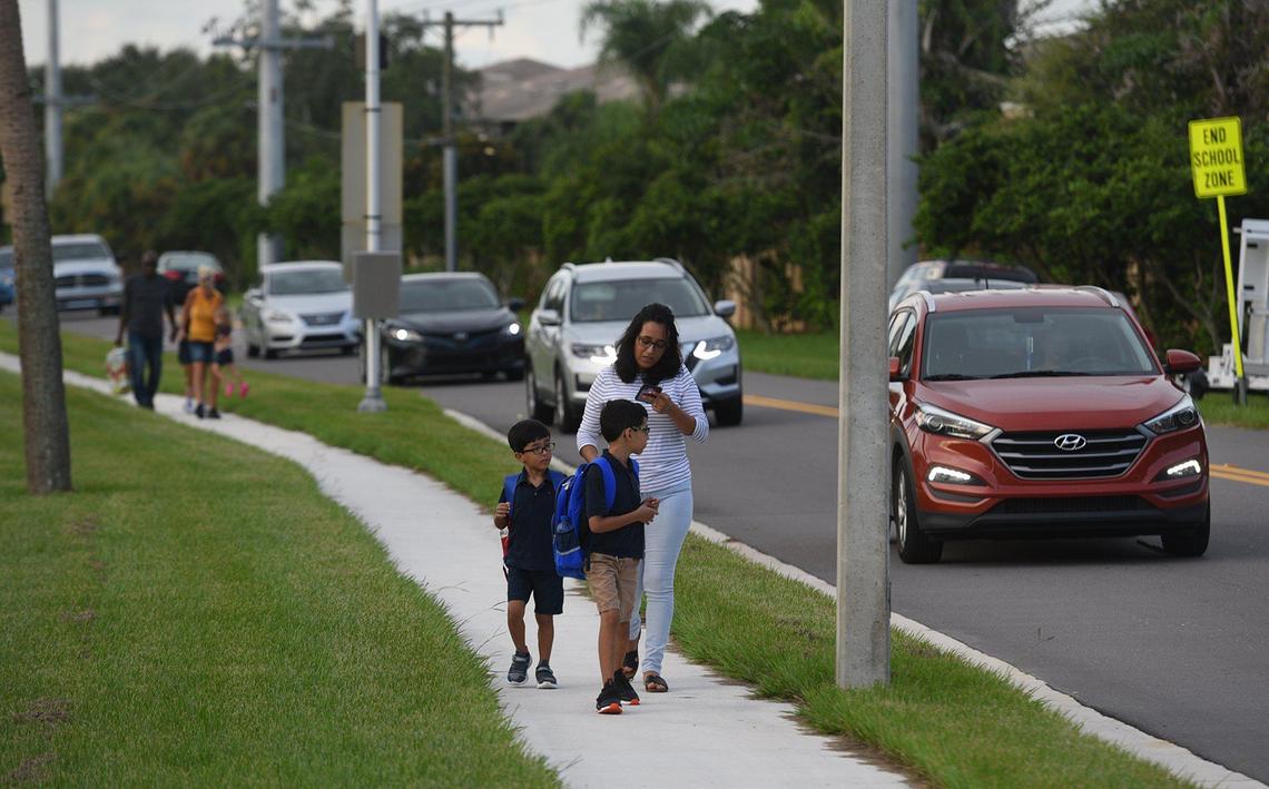 Parents arrive with students at Seabreeze Elementary on the first day of school for Manatee County students.