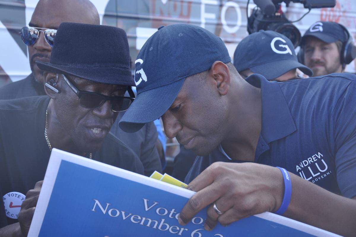 Andrew Gillum signs autographs following a Bradenton campaign stop to encourage early voting Saturday morning.