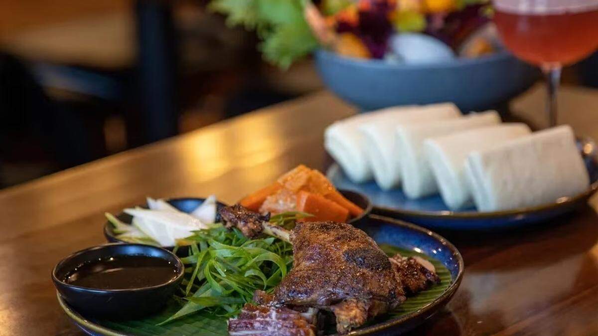 A make-your-own-bao dish with roasted duck is served at Sarasota’s Meliora, the Tampa Bay Times critic’s pick for the best new restaurant to open in 2022.