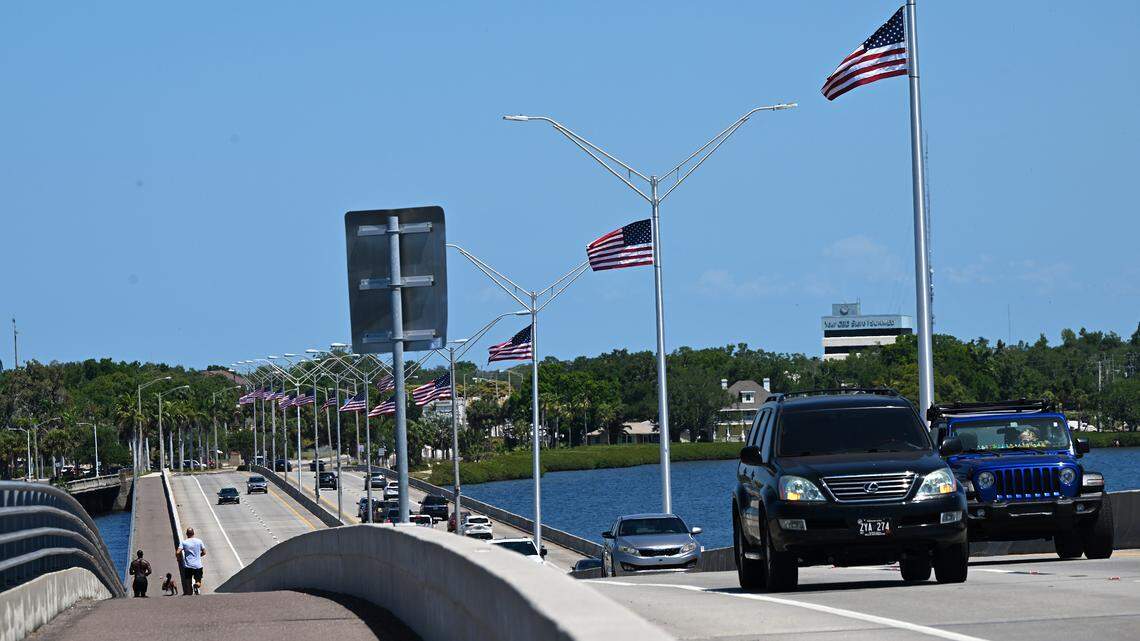 American flags fly from the light posts along the Green Bridge spanning from Bradenton to Palmetto shown on April 24, 2026. On the center pole flies a flag commemorating America’s 250th anniversary.