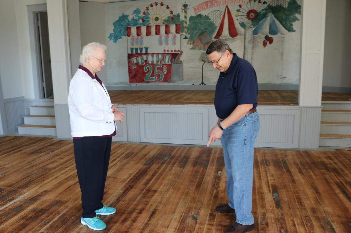 3/4/2021--Repair of the floors is one of the projects remaining at the historic 1914 Myakka City school. Shown above are Marilyn Coker and Walter Carlton.