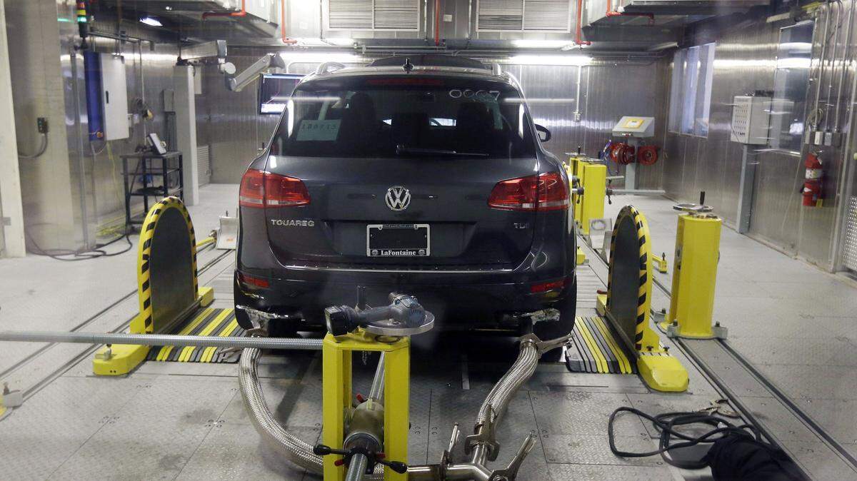 A Volkswagen Touareg diesel is tested last month in the Environmental Protection Agency's cold temperature test facility in Ann Arbor, Mich. The U.S. government says Volkswagen cheated a second time on emissions tests, programming about 10,000 cars with larger diesel engines, including the 2014 Touareg, 2015 Porsche Cayenne and the 2016 Audi A6 Quattro, A7 Quattro, A8 and Q5, to emit fewer pollutants during testing than in real-world driving conditions. ASSOCIATED PRESS FILE