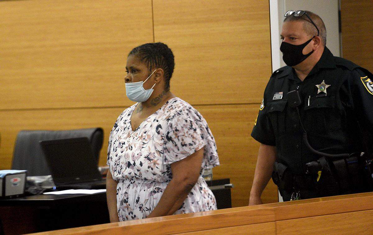06/17/21—Roberta McDonald is escorted into the courtroom on Wednesday on the third day of her trial for the second degree murder death of Anthony Wilson.