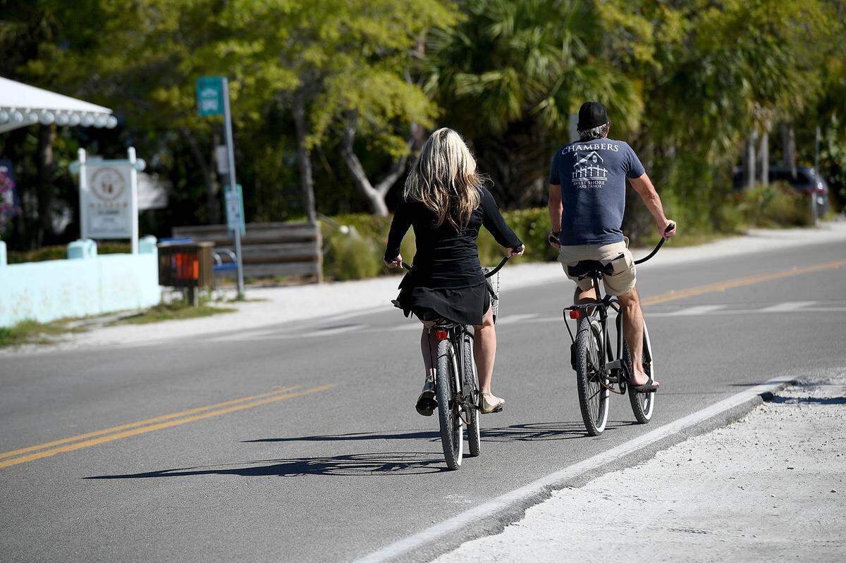 03/10/21--Cyclists enjoy a morning ride on Pine Avenue on Anna Maria Island March 10, 2021.