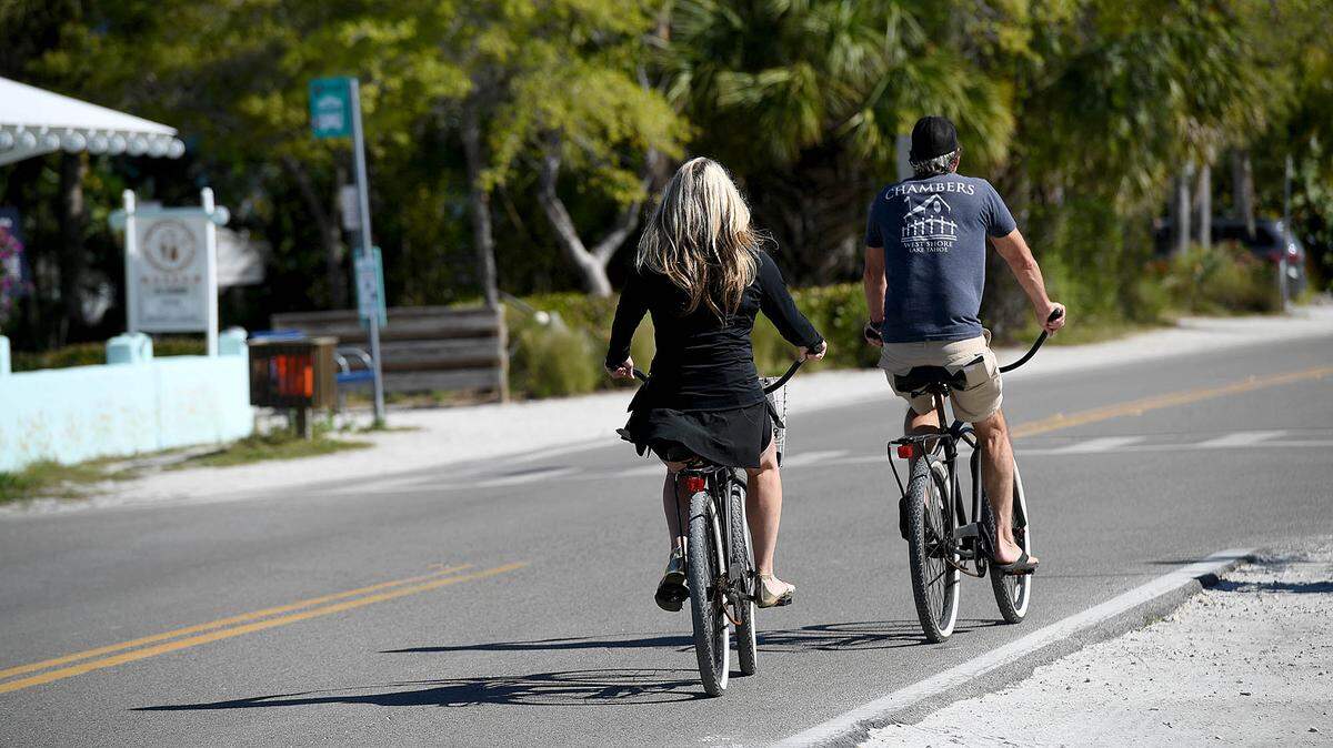 Cyclists enjoy a morning ride on Pine Avenue on Anna Maria Island March 10, 2021.