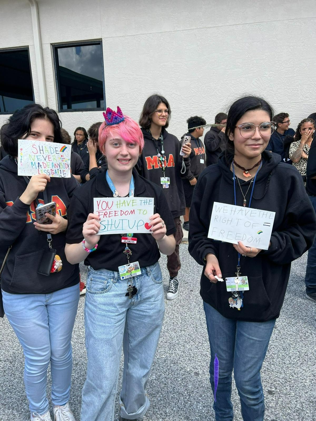 Students at Manatee School for the Arts gather in the school courtyard Friday afternoon to peacefully protest a statewide Florida rule change that bans LGBTQ content from school classrooms.