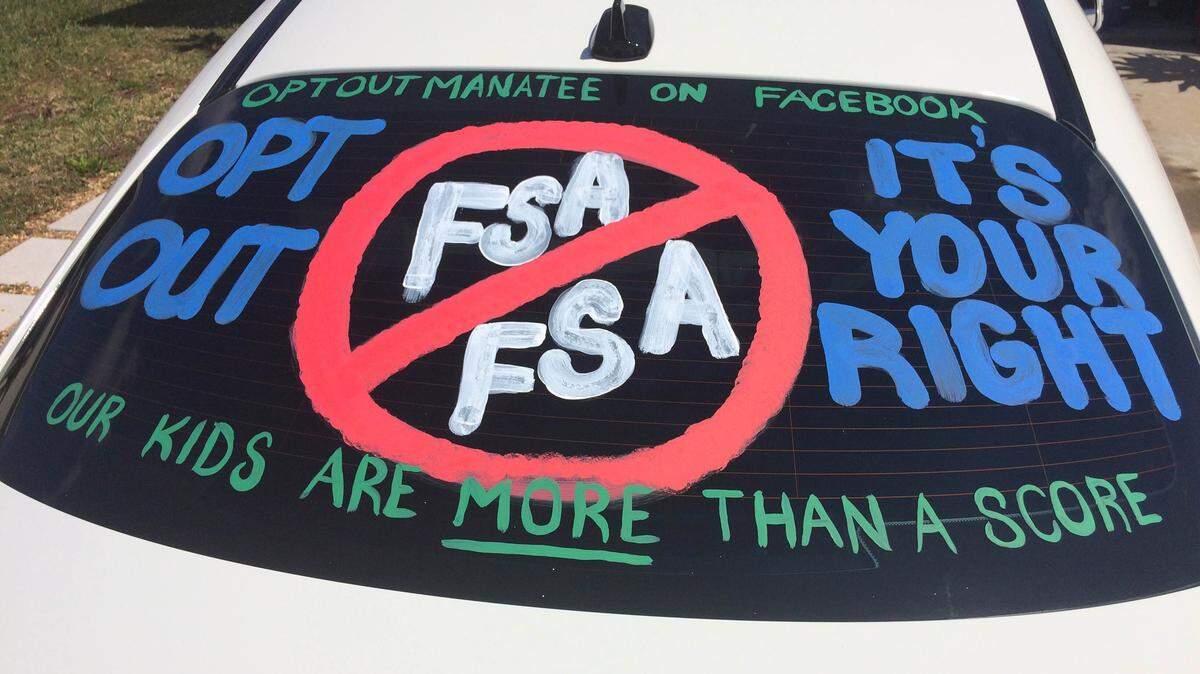 Amy Lee decorated her car before heading to school last month to show her support for ending high-stakes testing. Lee is one of a growing number of families who are opting out of state-mandating test in protest. PHOTO PROVIDED