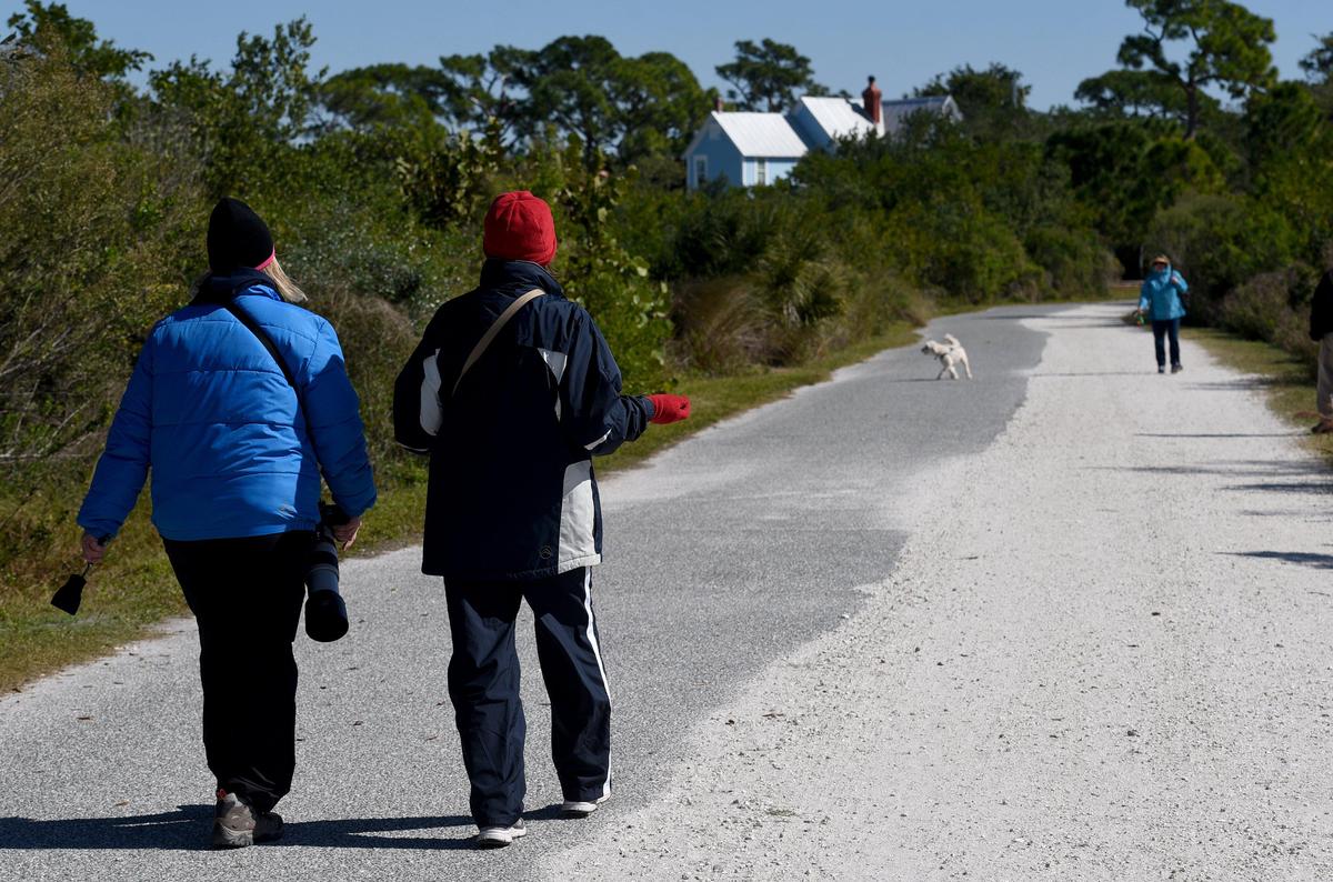 Visitors to Robinson Preserve bundled up for the cold temperatures in this Bradenton Herald file photo. According to the National Weather Service, Christmas Day 2022 was the coldest on record at the Sarasota-Bradenton International Airport.